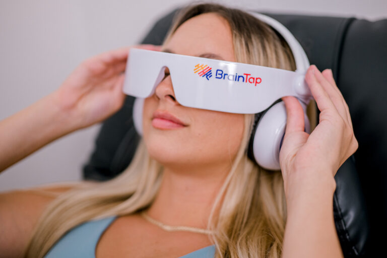 Woman using braintap for guided meditation